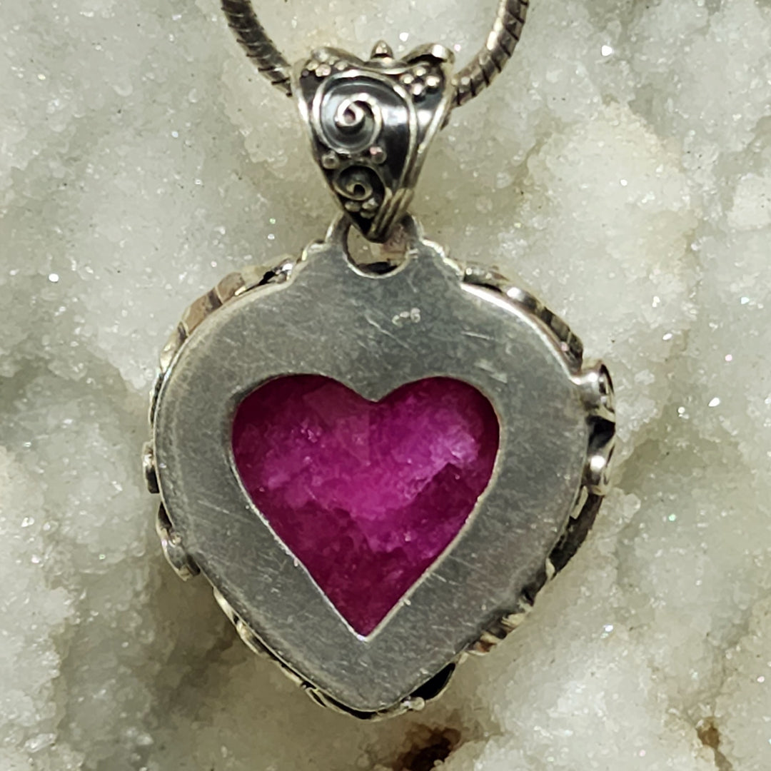 Dragonfly Encircled Heart Shaped Ruby Pendant