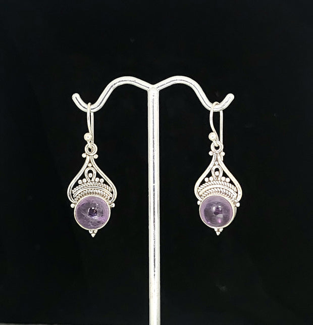 Round Amethyst with Ornate Silver Design