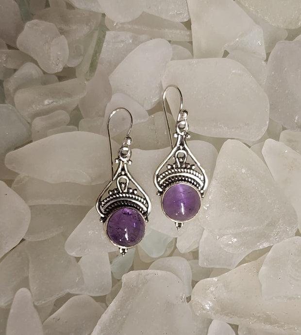 Round Amethyst with Ornate Silver Design